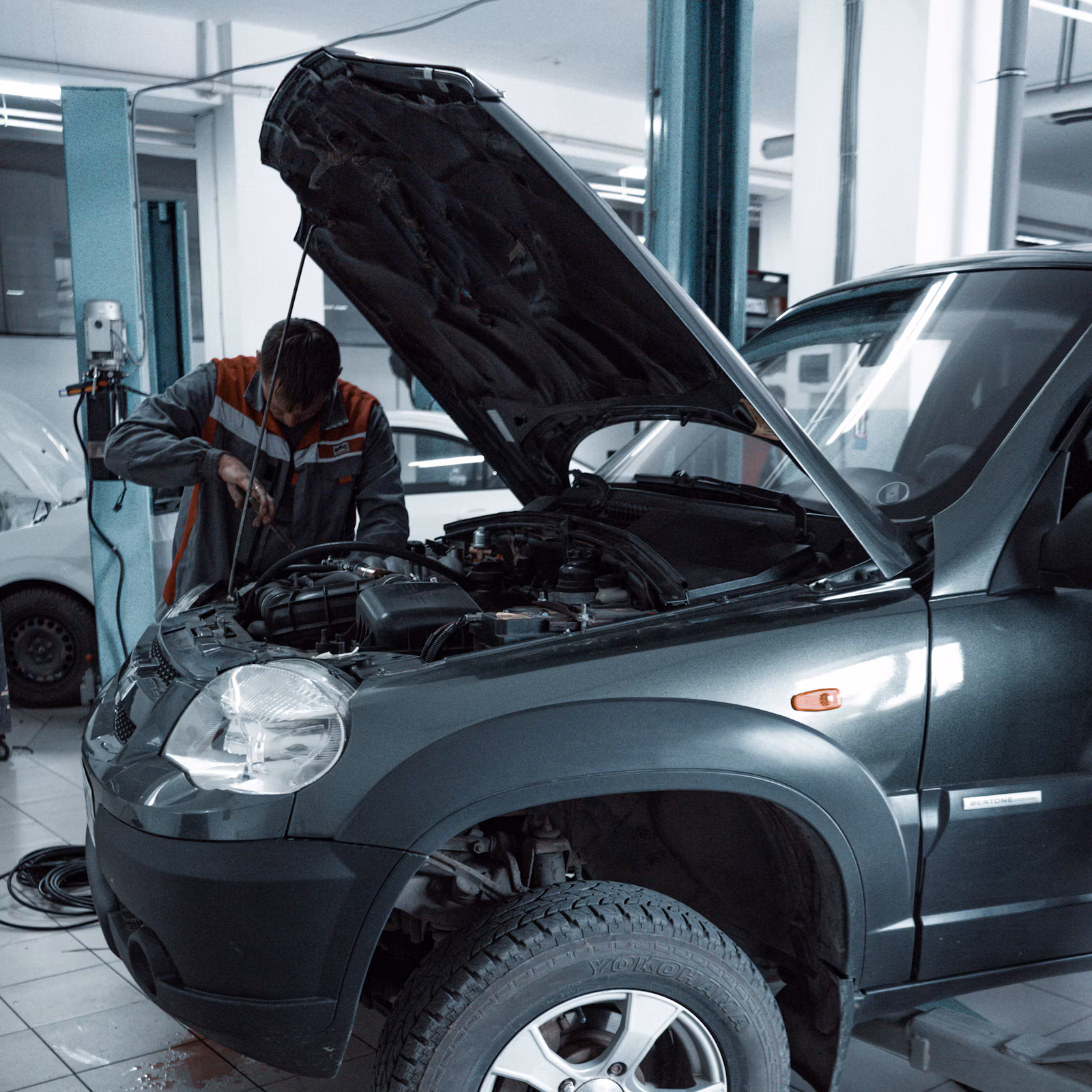 Mechanic inspecting a car